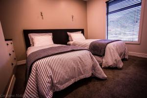 Ένα ή περισσότερα κρεβάτια σε δωμάτιο στο Cardrona Holiday Villa