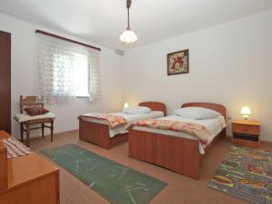 Postel nebo postele na pokoji v ubytování Apartment 1686