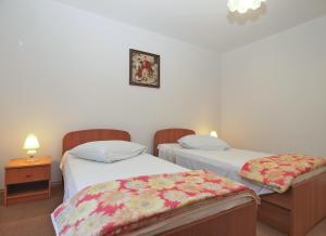 Postel nebo postele na pokoji v ubytování Apartment 1686