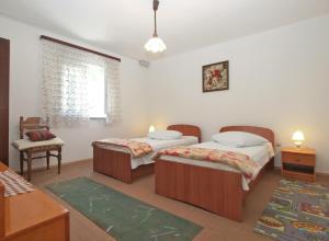 Postel nebo postele na pokoji v ubytování Apartment 1686