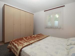 Postel nebo postele na pokoji v ubytování Apartment 1686