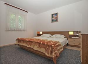 Postel nebo postele na pokoji v ubytování Apartment 1686