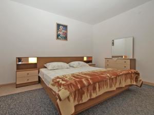 Postel nebo postele na pokoji v ubytování Apartment 1686
