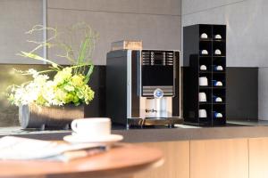 Кухня или мини-кухня в Centrair Hotel
