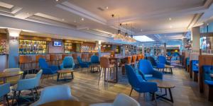 A seating area at Clayton Hotel, Manchester Airport