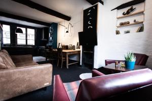 Posezení v ubytování Appartement atypique - coeur historique de Liège