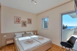 Postel nebo postele na pokoji v ubytování Villa hideaway Makarska + 32 fotografií