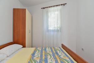 Postel nebo postele na pokoji v ubytování House Premantura 1096