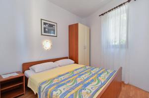 Postel nebo postele na pokoji v ubytování House Premantura 1096