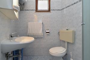 Koupelna v ubytování House Premantura 1096