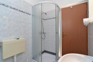 Koupelna v ubytování House Premantura 1096
