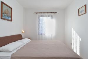 Postel nebo postele na pokoji v ubytování House Premantura 1096