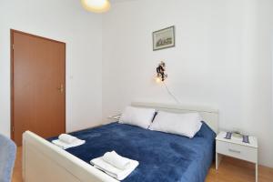 Postel nebo postele na pokoji v ubytování House Premantura 1096