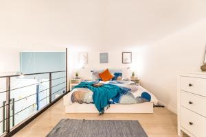 Katil atau katil-katil dalam bilik di Comfy designer apartment in ruin pub district