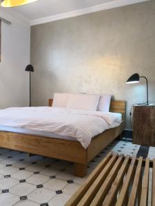 A bed or beds in a room at Casa Zenia Ana