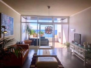 Posedenie v ubytovaní Casa Flamingo, Sea View Apartment