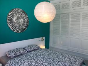 Ένα ή περισσότερα κρεβάτια σε δωμάτιο στο Casa Flamingo, Sea View Apartment