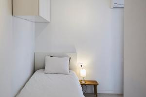 Postel nebo postele na pokoji v ubytování Sunny Beachfront Escape