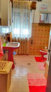 a bathroom with a shower and a sink and a toilet at Casa Rafael in Belmonte