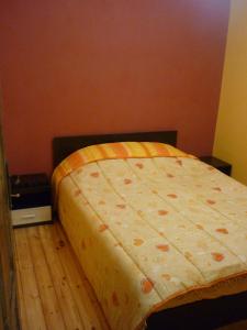 Guest House „Ivanovata house” tesisinde bir odada yatak veya yataklar