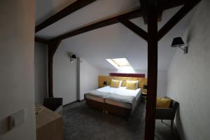 Łóżko lub łóżka w pokoju w obiekcie Hotel Arte