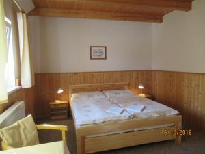 Postel nebo postele na pokoji v ubytování Guest House U Marie