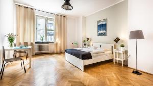 Posteľ alebo postele v izbe v ubytovaní Fenna Apartments 7 minut od Rynku