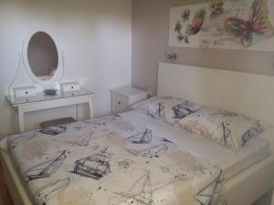 Posteľ alebo postele v izbe v ubytovaní Tone & Marta Apartments