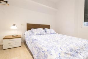 Posteľ alebo postele v izbe v ubytovaní Edificio 10 by Plaza Mayor Apartamentos