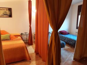 Postel nebo postele na pokoji v ubytování Loft Castelló