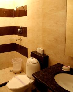 Kylpyhuone majoituspaikassa Hotel H R Palace