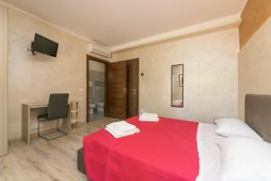 Postel nebo postele na pokoji v ubytování Red Lion Guest House