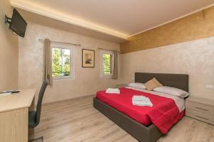 Postel nebo postele na pokoji v ubytování Red Lion Guest House