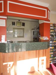 a kitchen with a counter top in a store at Value Inn East Stroudsburg in Marshalls Creek