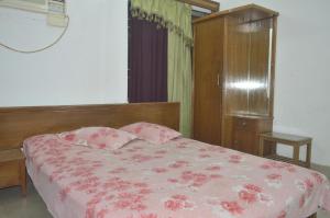 Ένα ή περισσότερα κρεβάτια σε δωμάτιο στο Hyperion Sea View