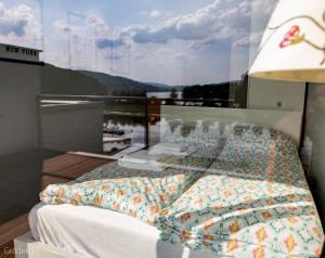 Ένα ή περισσότερα κρεβάτια σε δωμάτιο στο Apartment Słoneczny Gródek 11 +80 φωτογραφίες