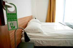 Ένα ή περισσότερα κρεβάτια σε δωμάτιο στο Simar