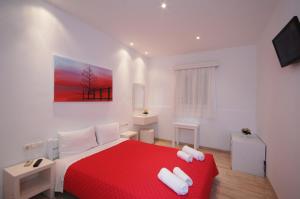 Postel nebo postele na pokoji v ubytování Hotel Milena