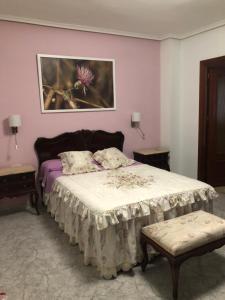 A bed or beds in a room at Peso de la Harina - piso completo
