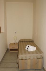 Кровать или кровати в номере Residence Belmare