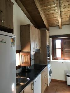 A kitchen or kitchenette at ALTO DE LA RESERVA