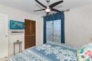 Ένα ή περισσότερα κρεβάτια σε δωμάτιο στο Alii Villas +17 φωτογραφίες