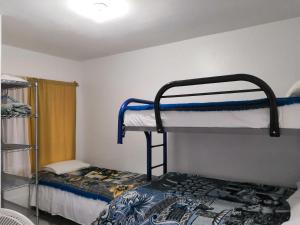 Katil atau katil-katil dalam bilik di Hostal Maple