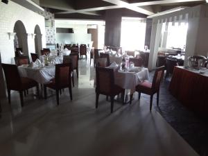 Restaurant o un lloc per menjar a Hotel Satkar Residency
