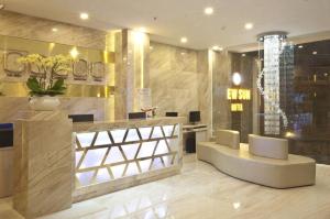 a lobby of a hotel with a reception desk at New Sun Hotel in Nha Trang