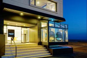 a building with stairs in front of a building at SEVEN SEAS HOTEL ITO (セブンシーズホテル） in Ito