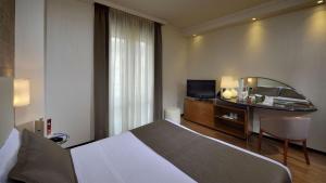 Posteľ alebo postele v izbe v ubytovaní Best Western Hotel City