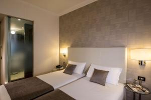 Posteľ alebo postele v izbe v ubytovaní Best Western Hotel City