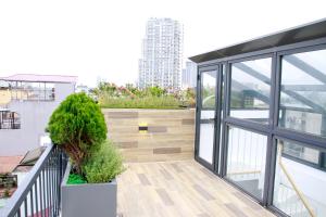 Balcon ou terrasse dans l'établissement Sky Garden Serviced Apartment