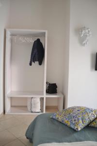 A bed or beds in a room at PIETRAVIVA
